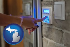 michigan map icon and woman pressing a key on a home alarm keypad