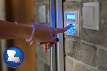 woman pressing a key on a home alarm keypad - with Louisiana icon