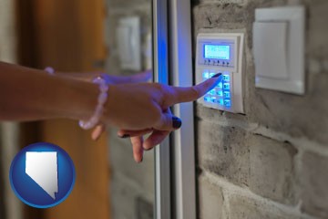 woman pressing a key on a home alarm keypad - with Nevada icon