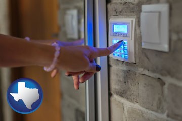 woman pressing a key on a home alarm keypad - with Texas icon