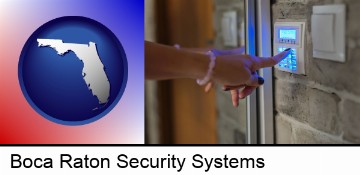 woman pressing a key on a home alarm keypad in Boca Raton, FL