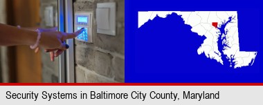 woman pressing a key on a home alarm keypad; Baltimore City highlighted in red on a map