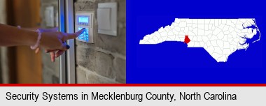 woman pressing a key on a home alarm keypad; Mecklenburg County highlighted in red on a map