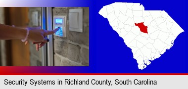 woman pressing a key on a home alarm keypad; Richland County highlighted in red on a map